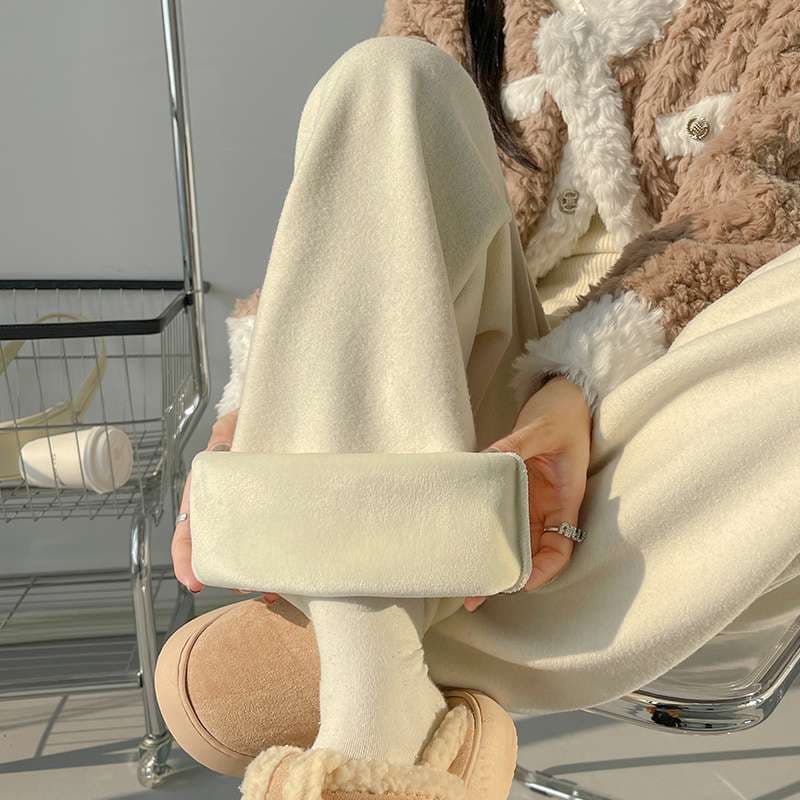 白パンツ ゆったりフィット 裾リブ付きロングパンツ