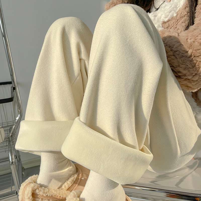 白パンツ ゆったりフィット 裾リブ付きロングパンツ